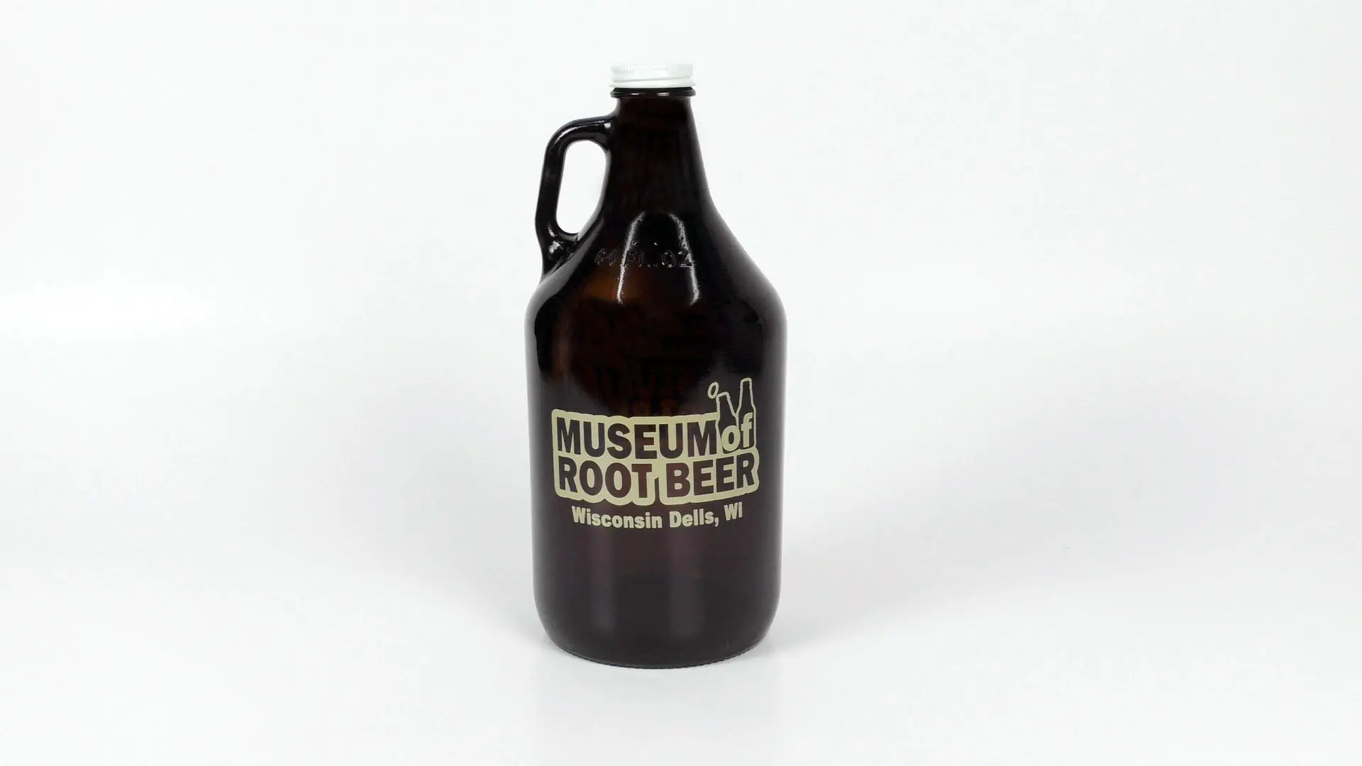 A glass growler with a cap, prominently labeled "Museum of Root Beer, Wisconsin Dells, WI," is showcased against a plain white backdrop, capturing the essence of this unique beer museum.