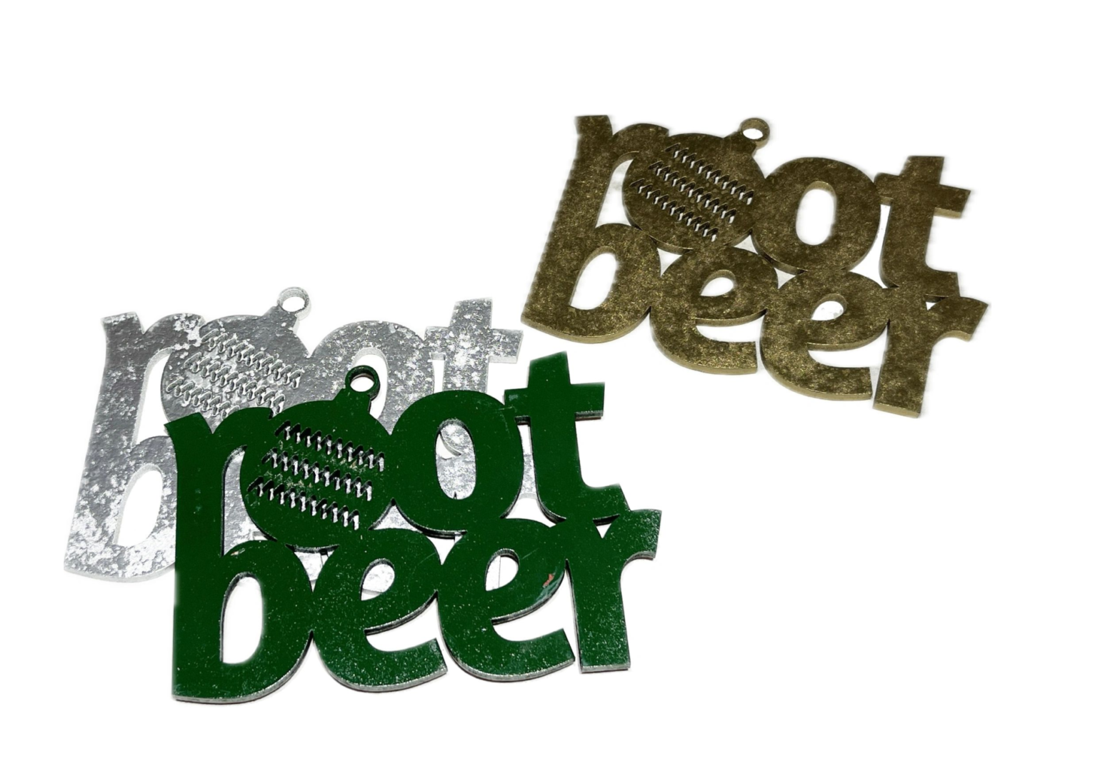 Three "root beer"-themed ornaments in vibrant green, luxurious gold, and elegant silver, featuring a textured design that evokes the charm of classic beer memorabilia.